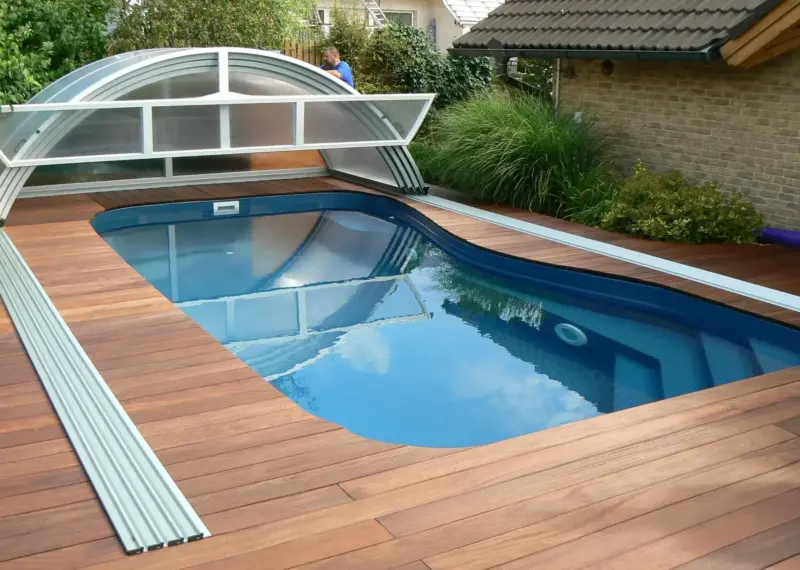 Full swimming pool enclosure retracted - Arcus Products